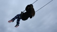 Child swinging on a swing